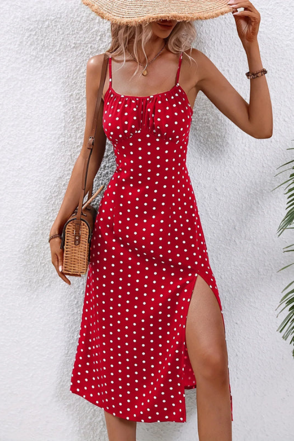 Women's elegant pleated halter dress in a midi length, perfect flowy party wear.