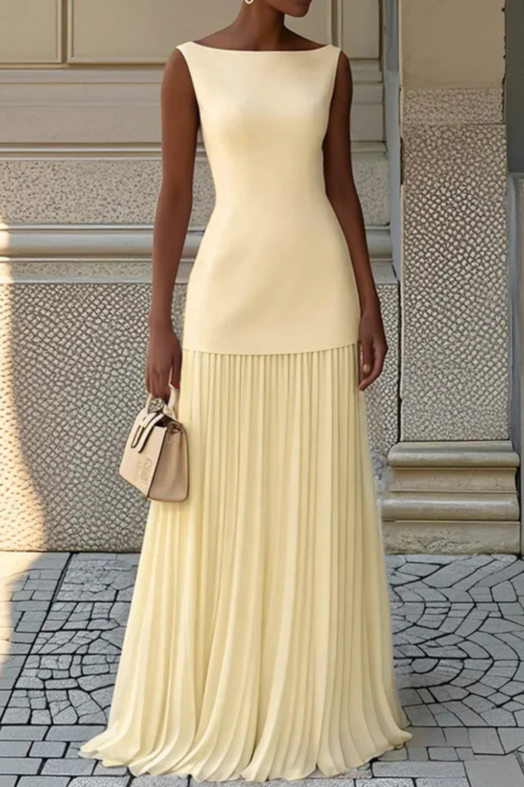 Elegant flowing pleated maxi dress for women, a beautiful formal evening gown for special occasions.