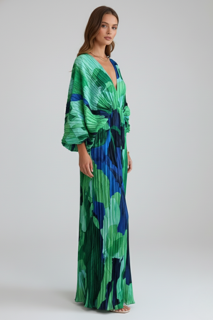 Stunning women's long pleated maxi dress featuring a flattering V-neck and a daring side slit for an elegant look.