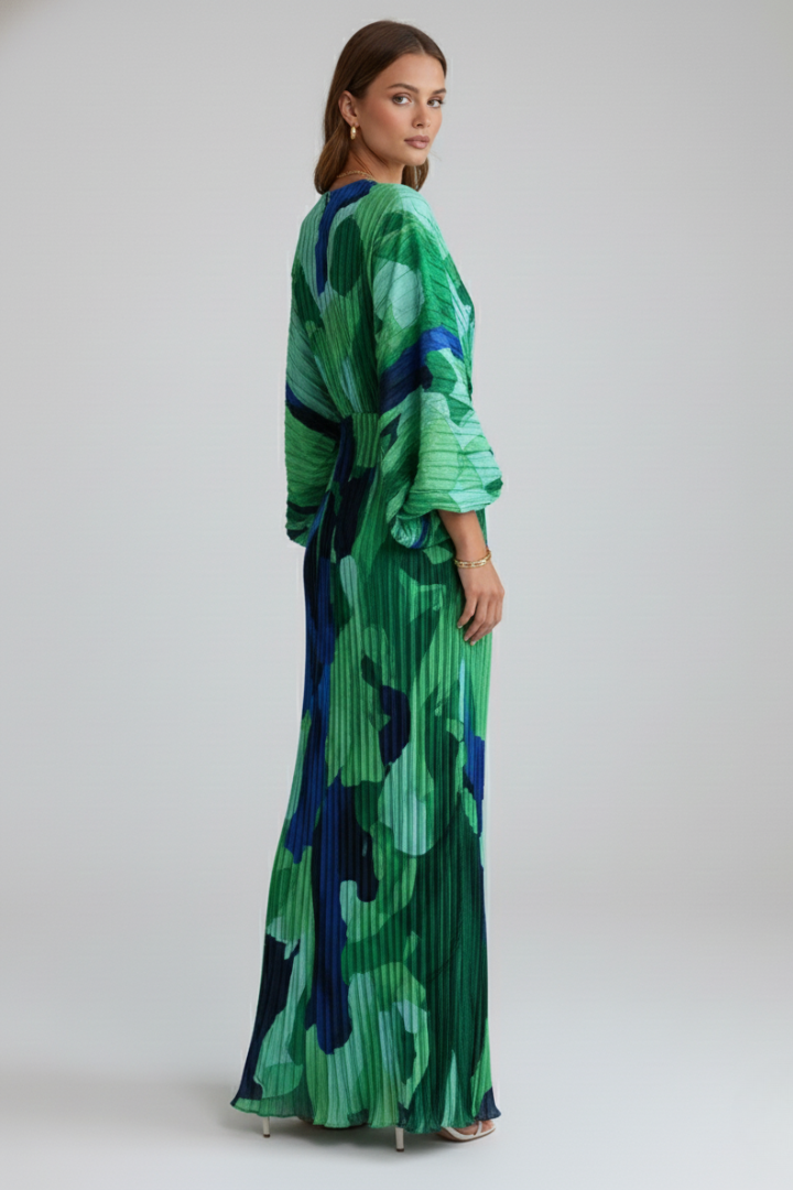 Sophisticated women's pleated maxi dress, V-neck, & side slit for an elegant, comfortable summer or evening outfit.