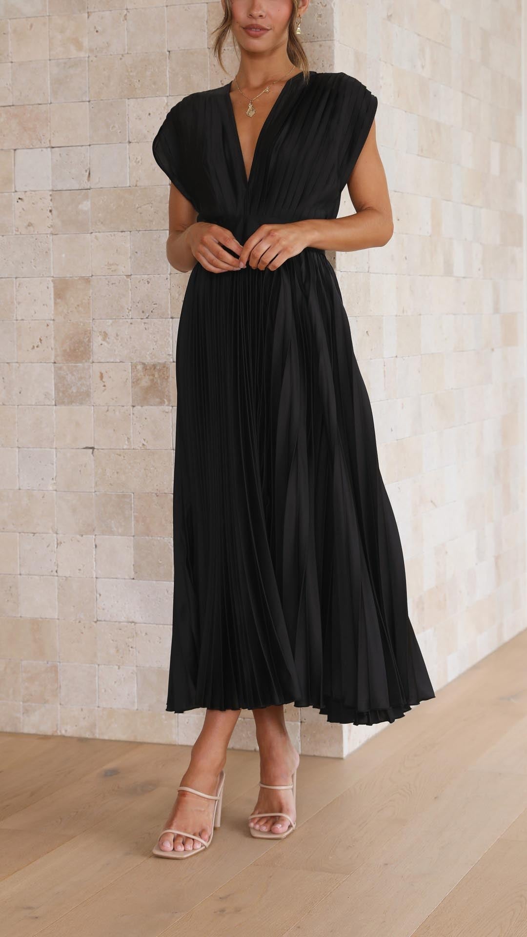 Pleated maxi dress for women, deep V-neck, sleeveless, an elegant choice for any party.