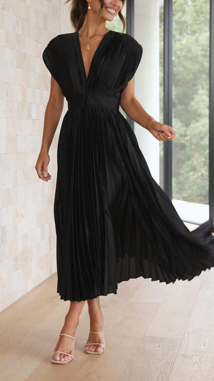 Long pleated formal dress with deep V-neck, sleeveless, an elegant choice for women.