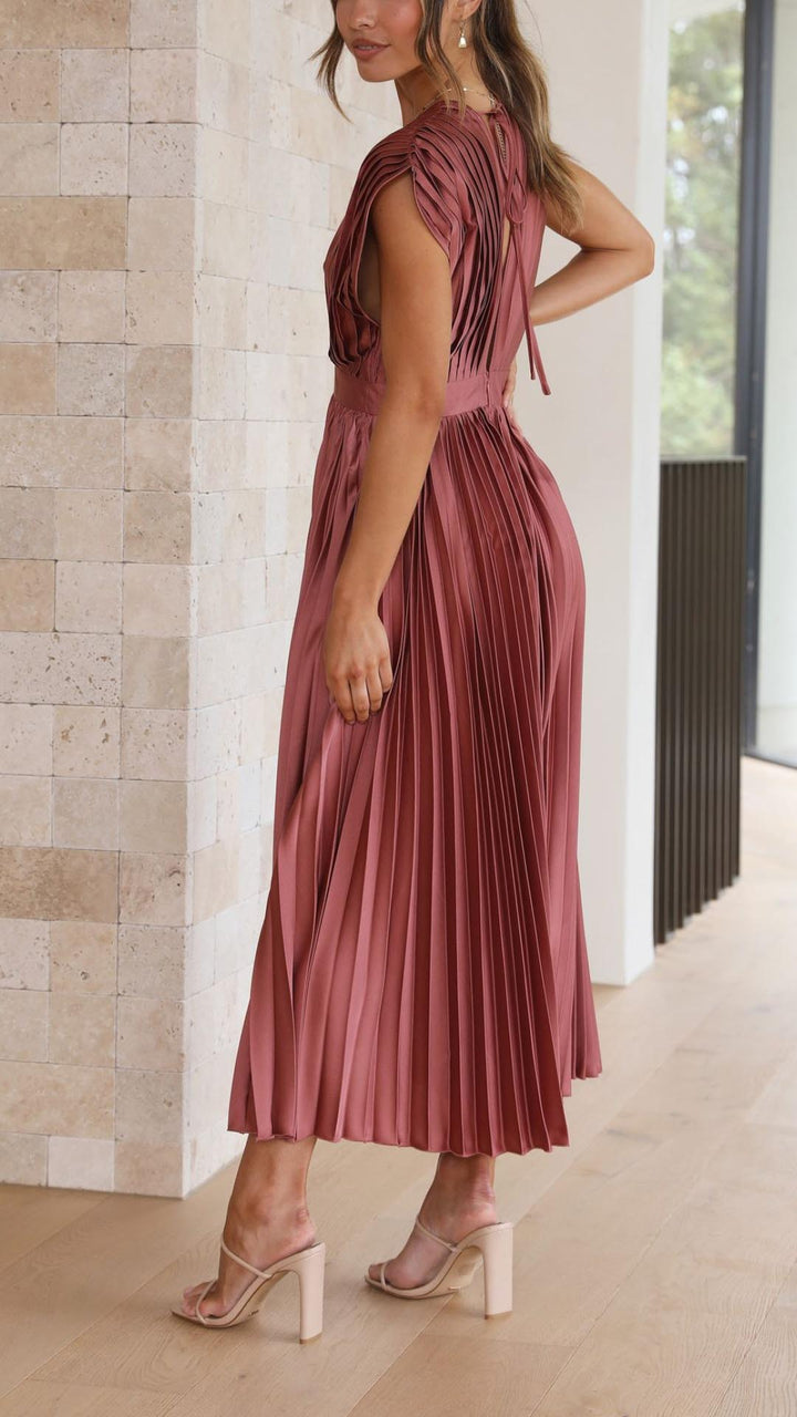 Deep V-neck sleeveless pleated maxi dress, a chic and elegant option for evening wear.