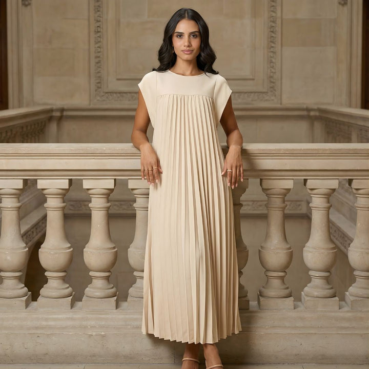Elegant women's pleated maxi dress with extended cap sleeves & relaxed empire waist. Perfect for occasions.