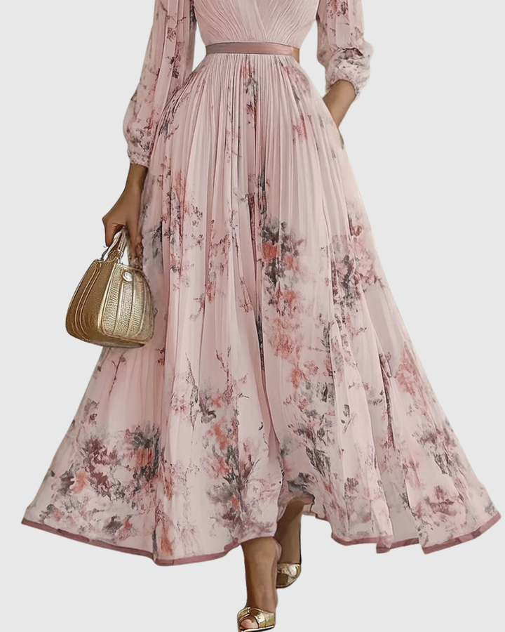 Sophisticated women's pleated long sleeve maxi dress, floral print. V-neck elegant style suitable for occasion wear.
