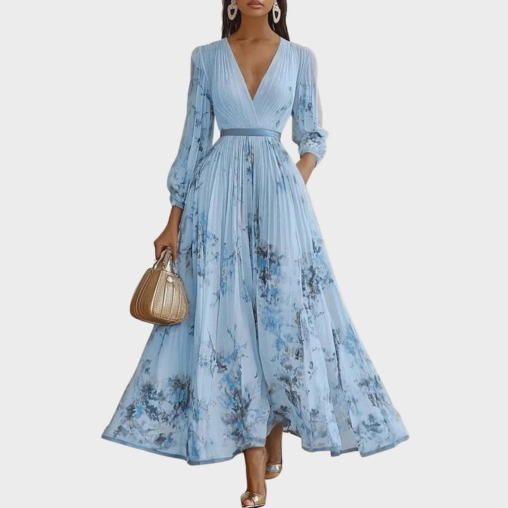 Stunning women's pleated floral print maxi dress with long sleeves. Elegant V-neck design for parties & events.