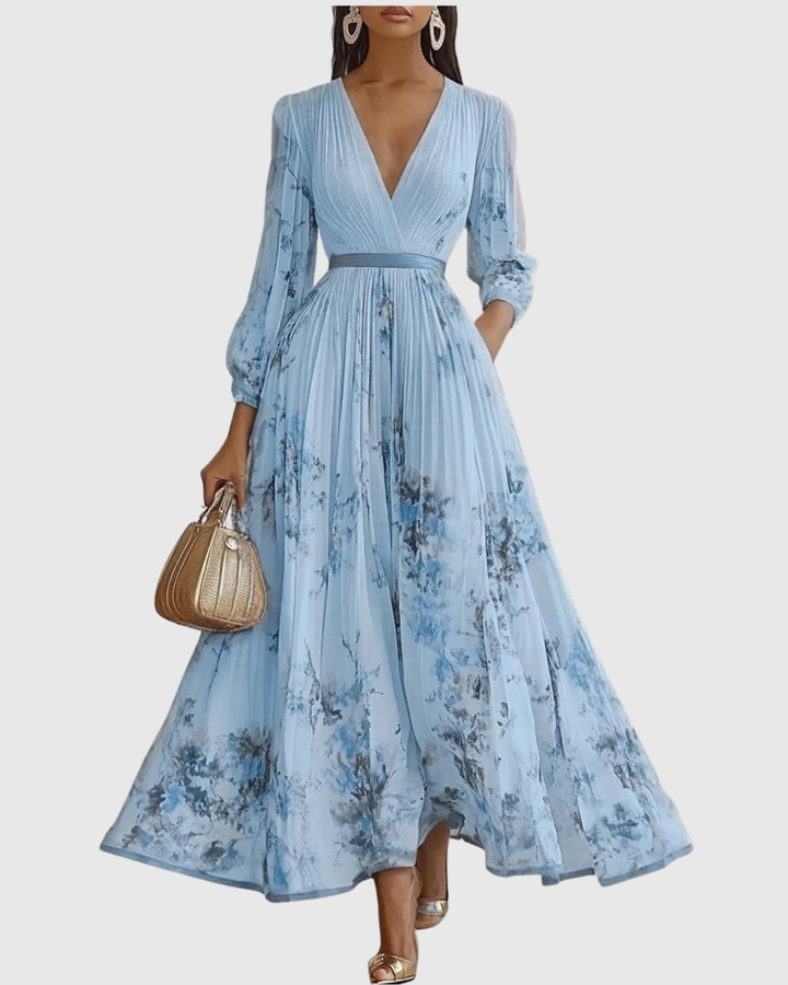 Elegant women's floral print V-neck maxi dress with delicate pleats & long sleeves. Perfect party or occasion wear.