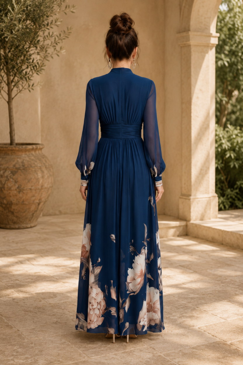 Stunning long pleated maxi dress for women featuring elegant sheer sleeves, suitable for formal events.