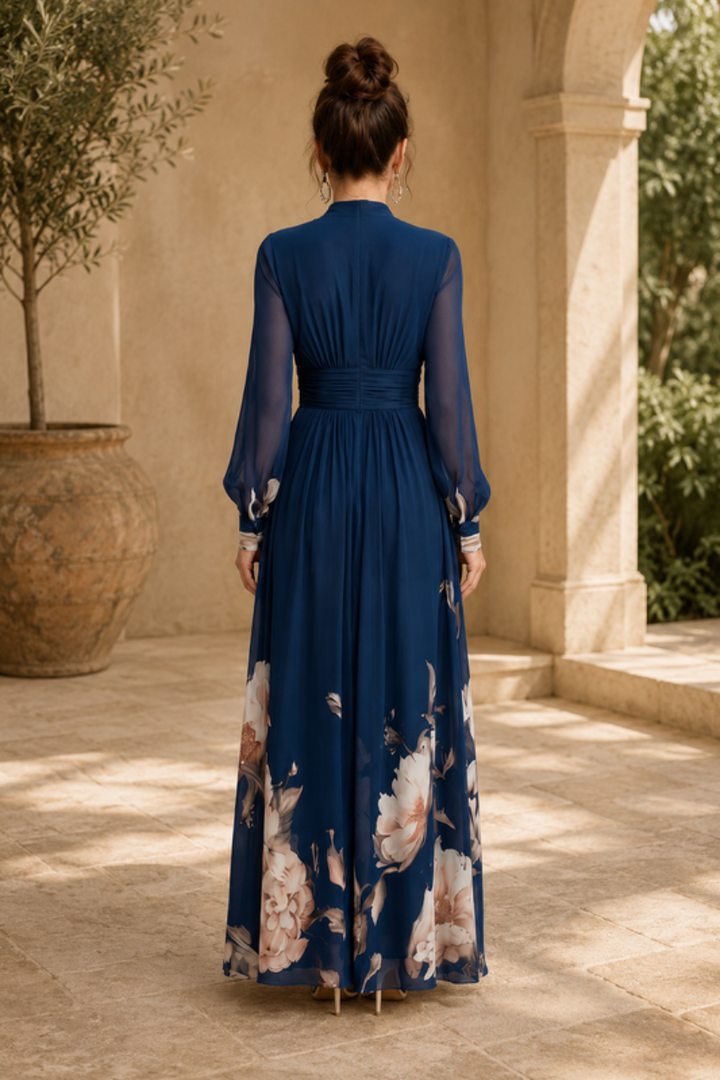 Stunning long pleated maxi dress for women featuring elegant sheer sleeves, suitable for formal events.