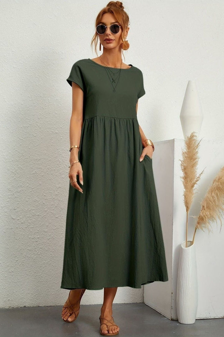 Elegant women's pleated midi dress for sophisticated style. Perfect for spring & summer occasions.