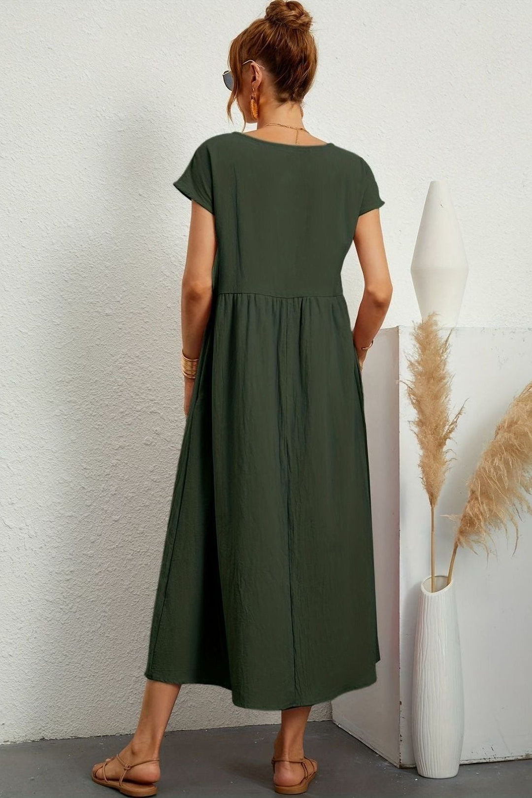 Versatile women's pleated midi dress for office, casual, or party wear. Effortless, comfortable, chic.