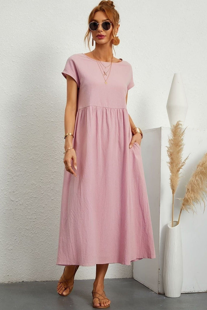 Make a statement with this elegant women's pleated midi dress, perfect for any event. Summer fashion.