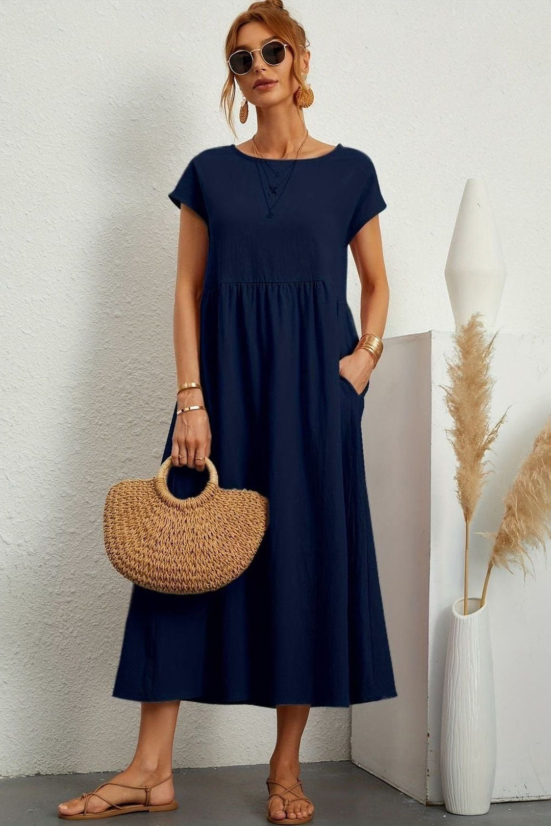 Stylish women's pleated midi dress, perfect for parties & special occasions. Relaxed & comfortable fit.