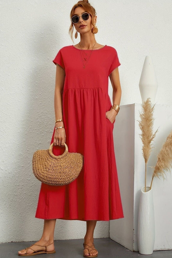 Chic and comfortable women's pleated midi dress for versatile daily wear. Perfect for spring & summer.