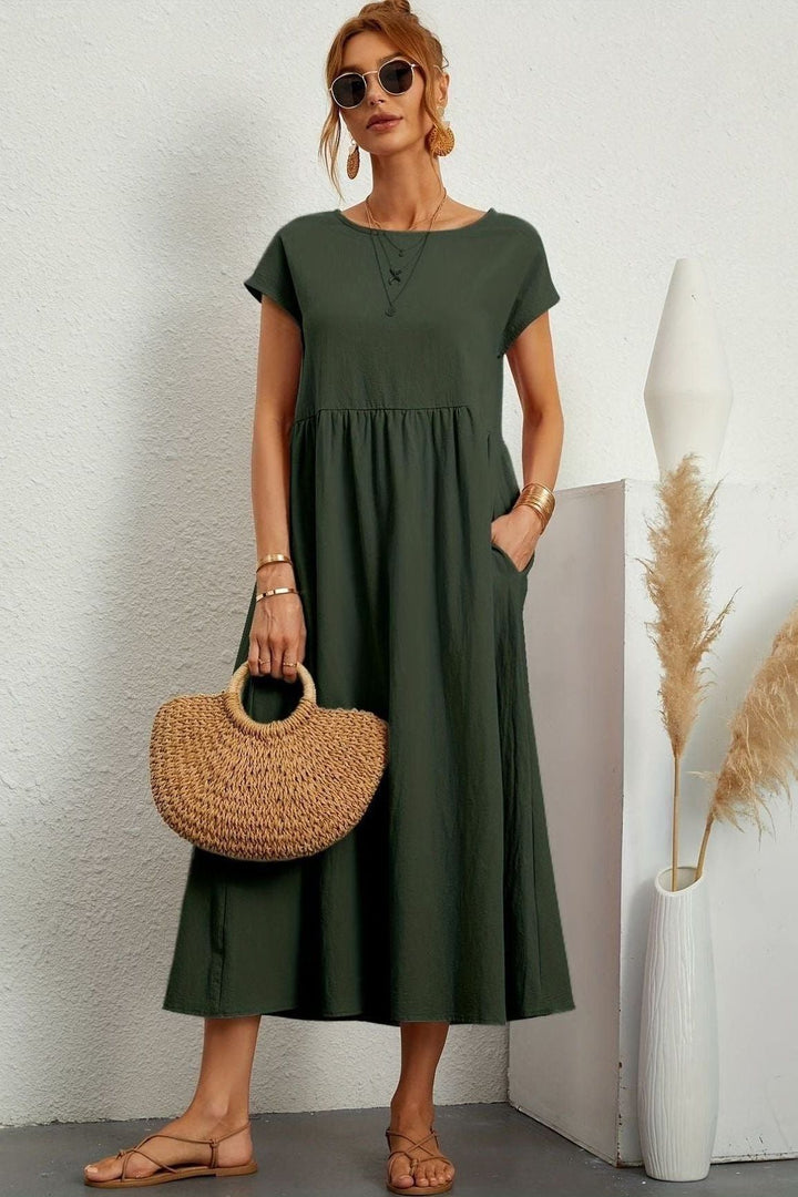 Breathable fabric women's elegant pleated midi dress, perfect for warm weather & relaxed fit comfort.