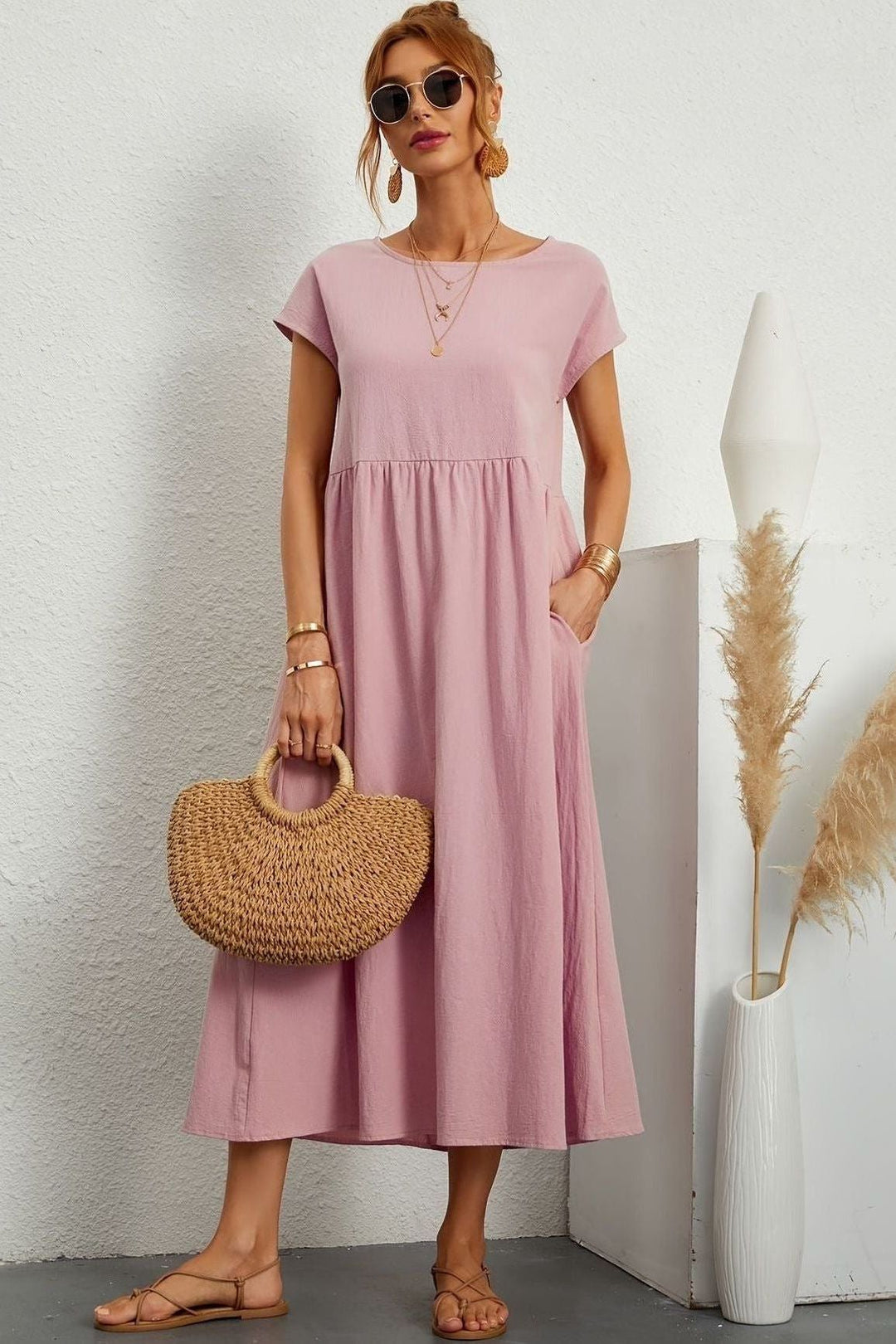 Day-to-night women's pleated midi dress, easily dressed up or down for any occasion. Elegant & comfy.