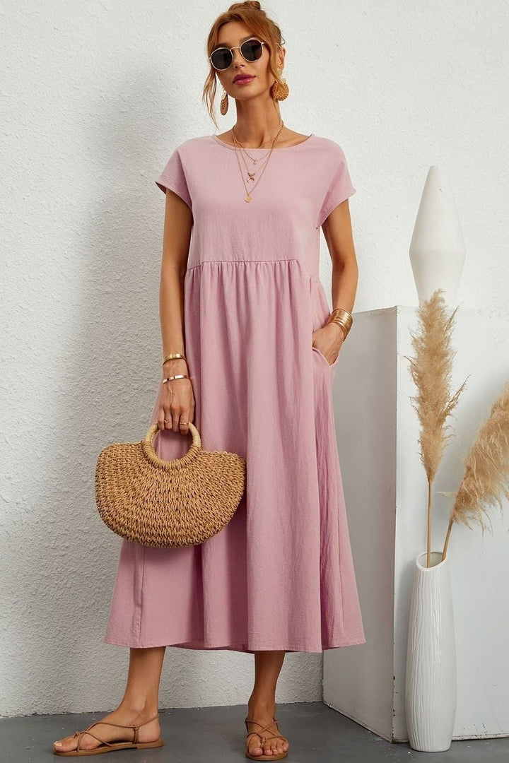 Day-to-night women's pleated midi dress, easily dressed up or down for any occasion. Elegant & comfy.