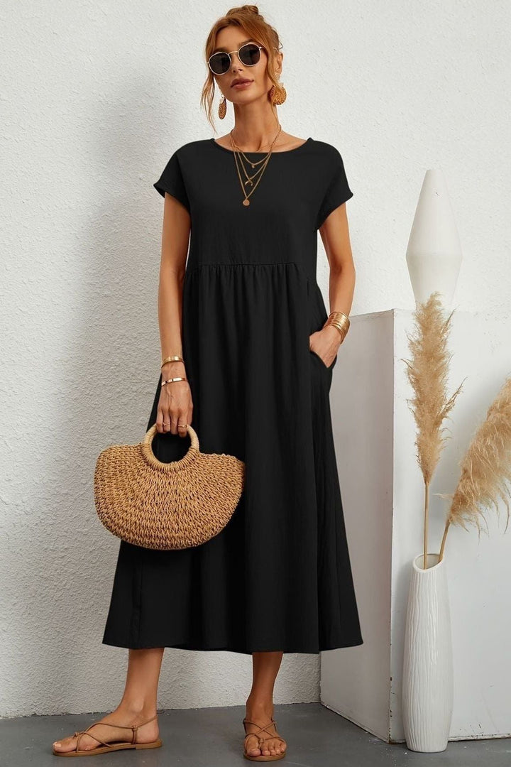 A wardrobe essential: elegant women's pleated midi dress for ultimate versatility, comfort & fashion.