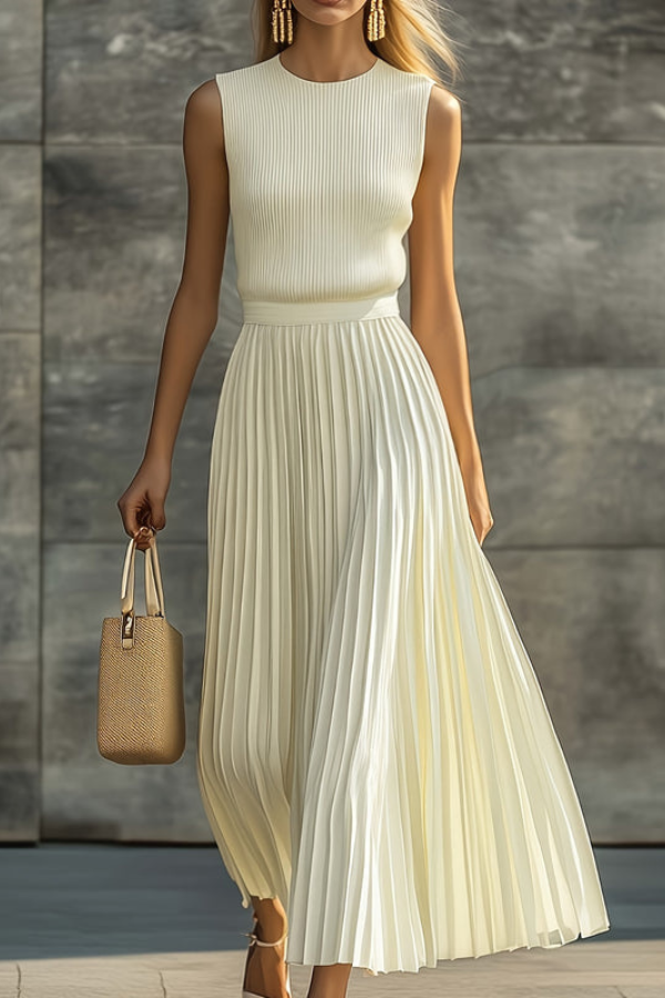 Elegant women's pleated midi dress, sleeveless & flowing for summer. Perfect for brunch or casual wear.