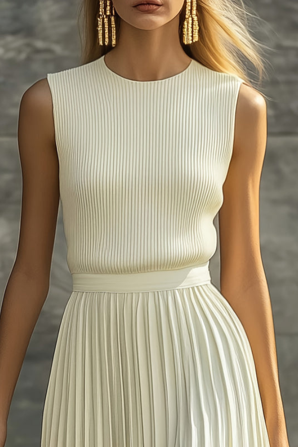 Women's elegant pleated midi dress with a sleeveless design, perfect for a flowy summer style.