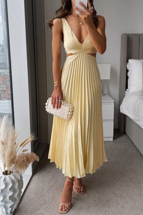Elegant women's pleated midi dress with a flowing design, perfect for parties & special occasions.