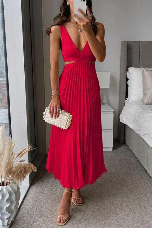Comfortable & chic women's summer midi dress, with a flattering V-neck, flowing design, and elegant pleats.
