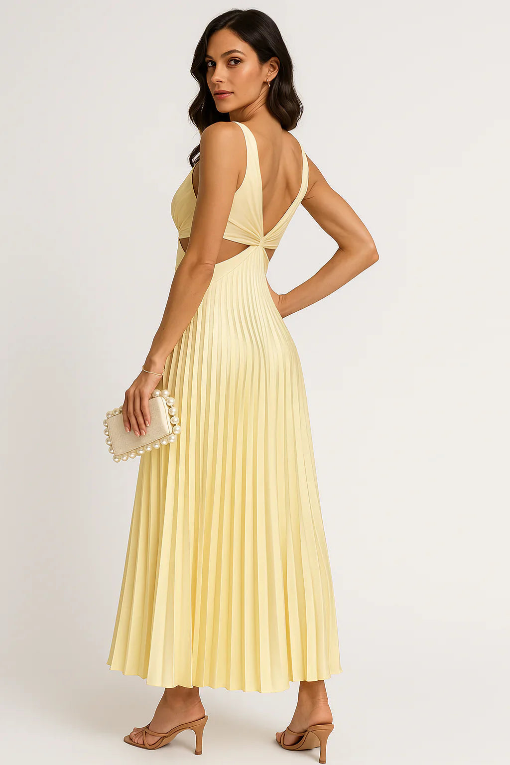 Full shot of a woman in a flowing pleated midi dress, showcasing its elegant design for parties and occasions.