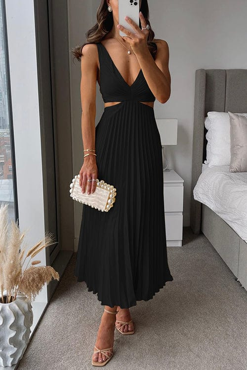 Graceful women's pleated midi dress with a flowing skirt, perfect for movement & elegance at summer gatherings.
