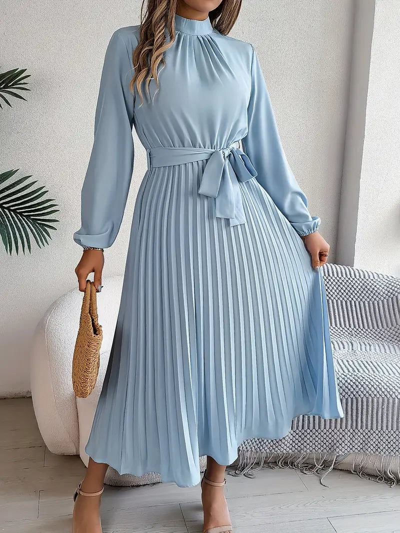 Elegant women's pleated midi dress with long sleeves and a stylish belt. Perfect for autumn or spring events.