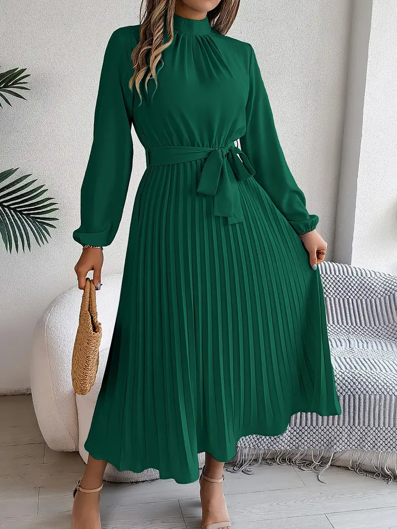Chic women's formal midi dress with elegant pleats, long sleeves, and a defined belt. Modest and stylish.