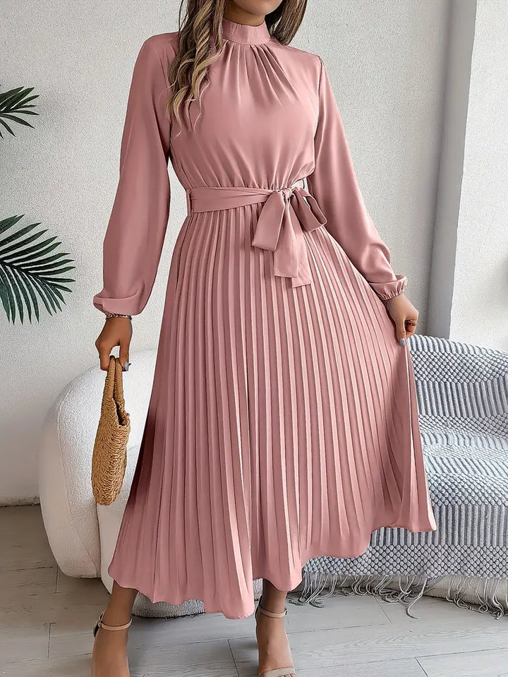 Autumn women's elegant pleated dress with long sleeves & belt. A versatile midi length for many occasions.