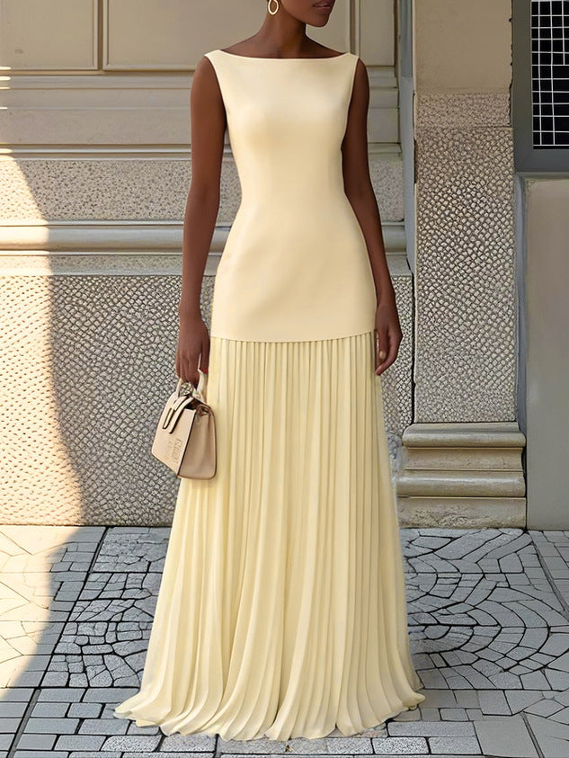 Stylish women's pleated sleeveless maxi dress, high neck, elegant & flowy. Versatile for casual or occasion wear.
