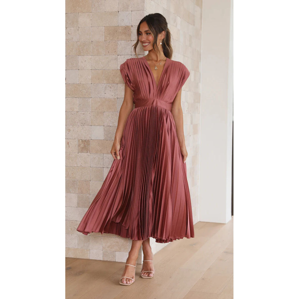 Flared pleated V-neck midi dress for women, embodying effortless style & comfort.