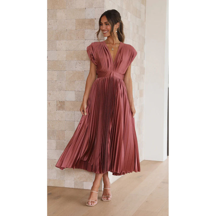 Flared pleated V-neck midi dress for women, embodying effortless style & comfort.
