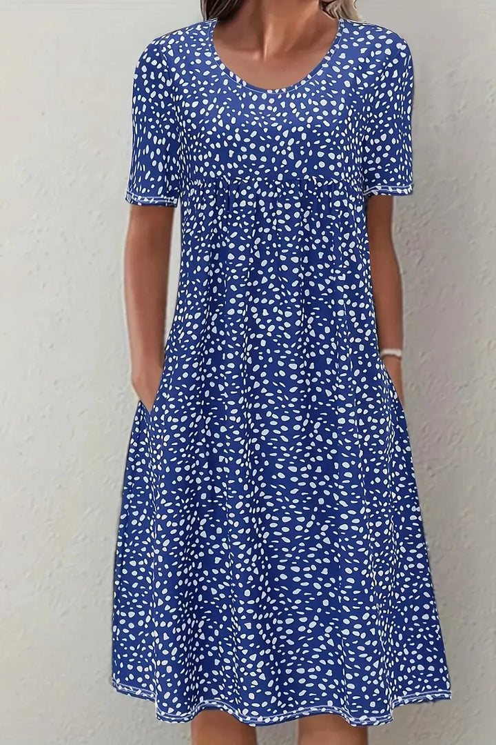 Modest women's long midi dress with a flattering pleated waist, designed for elegant occasion wear.