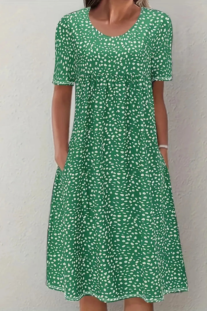 Versatile women's elegant midi dress with a pleated waist, suitable for both formal & semi-formal attire.