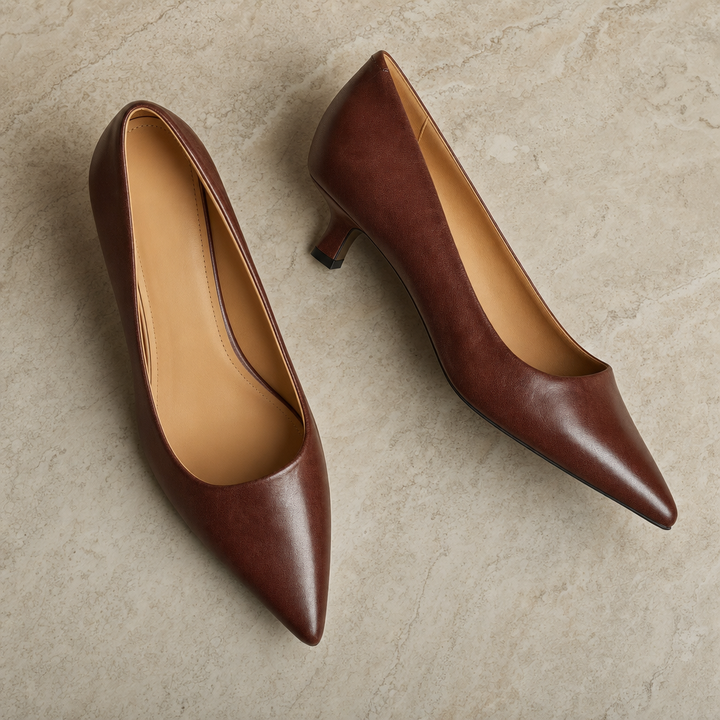 Slip-on women's pumps with a sleek pointed toe & thin heel, ideal for formal attire & special occasions.