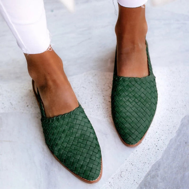 Chic women's pointed toe slip-on flat mules, combining comfort and elegance for modern footwear.