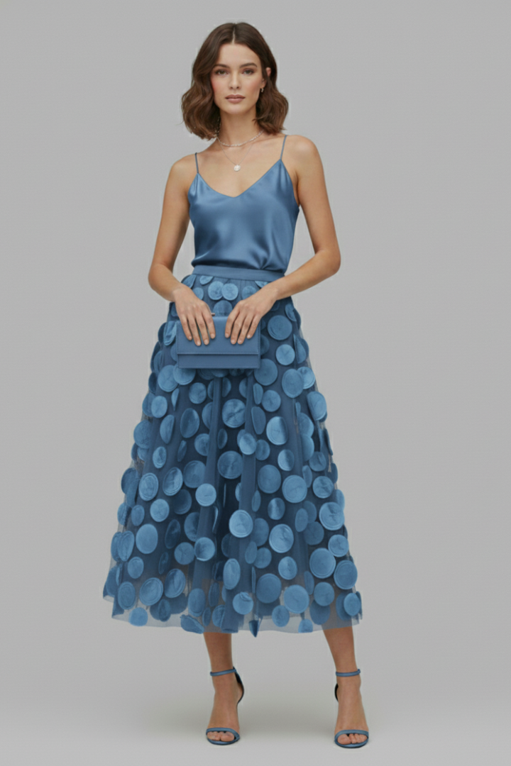 Women's elegant polka dot full skirt, a stylish and versatile midi length for any occasion.