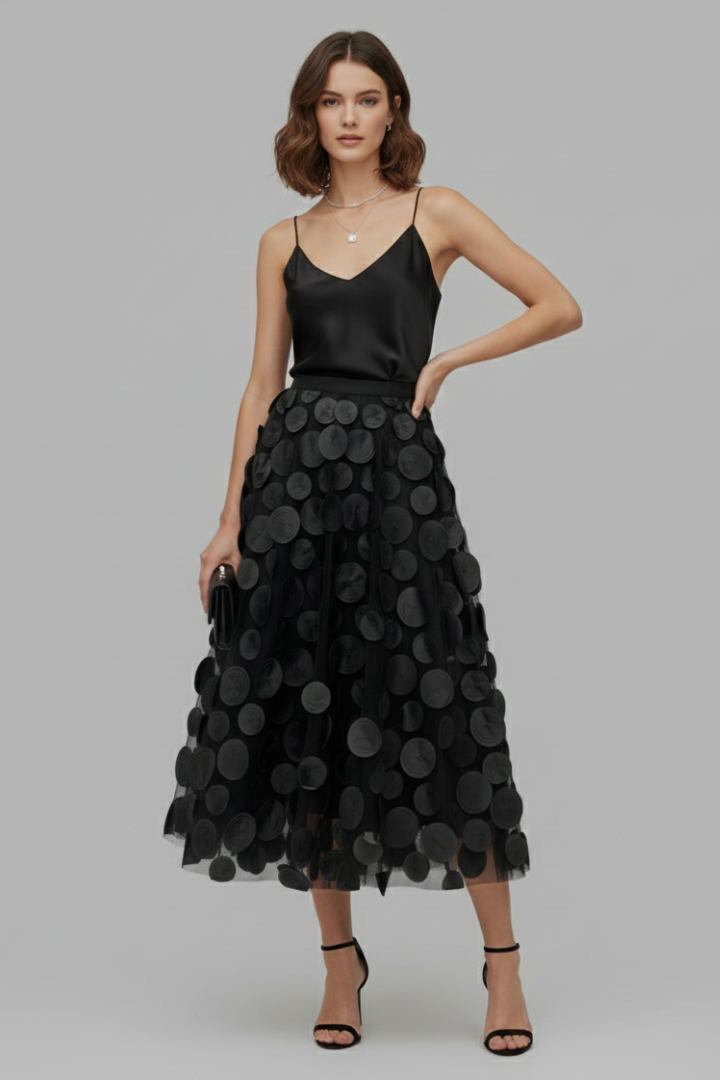 Versatile flowy polka dot full skirt for women, ideal for casual chic outfits or elegant events.