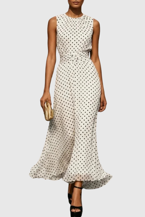 Elegant women's polka dot halter neck maxi dress with keyhole detail, perfect for summer fashion.