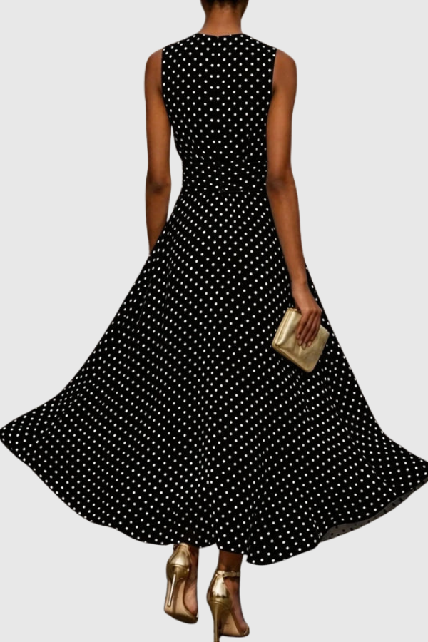 Chic women's sleeveless polka dot maxi dress with a sophisticated halter neckline and keyhole design.