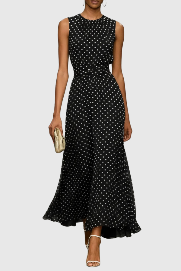 A-line women's summer maxi dress featuring a classic polka dot pattern, halter neck, and elegant keyhole.