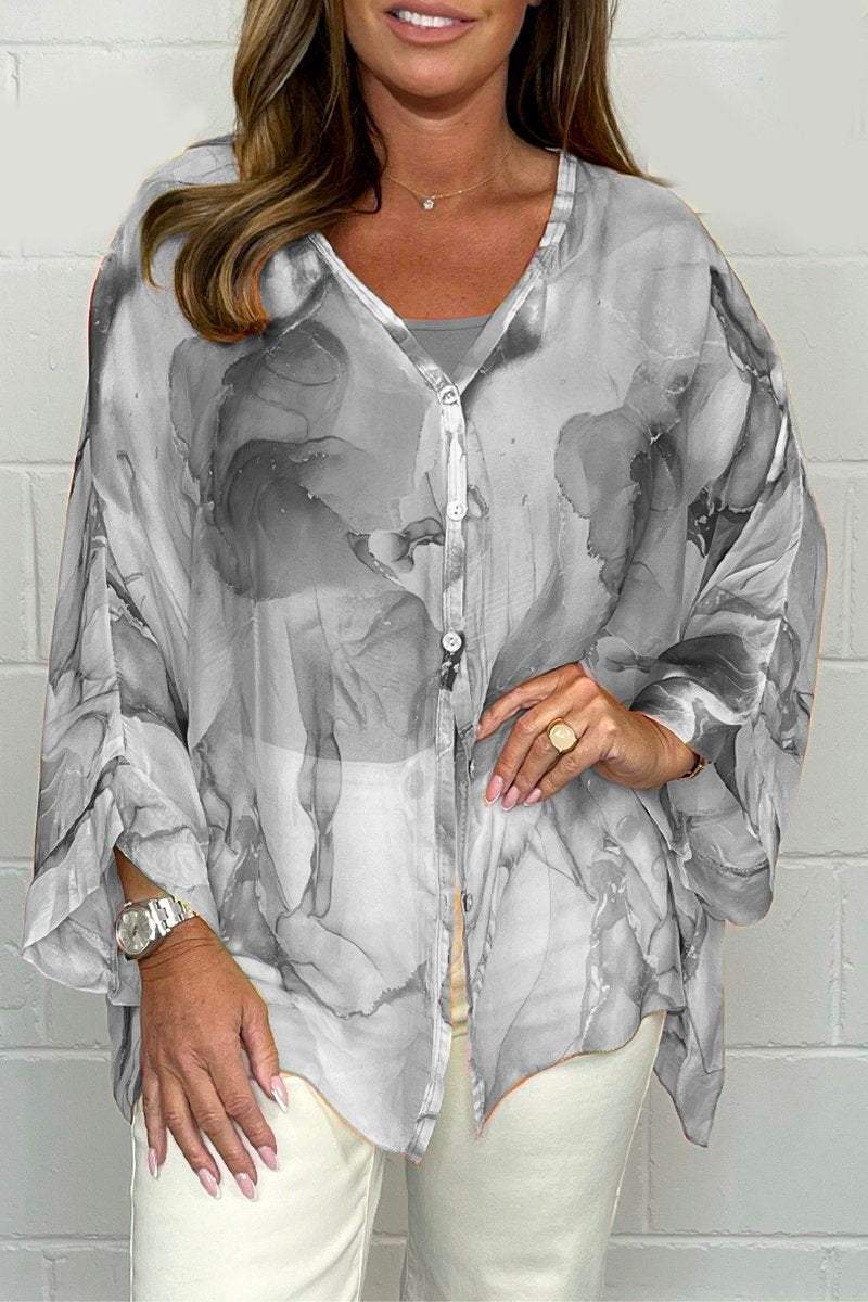 Elegant women's printed long sleeve blouse for chic spring & summer fashion. Comfortable & versatile top for women.