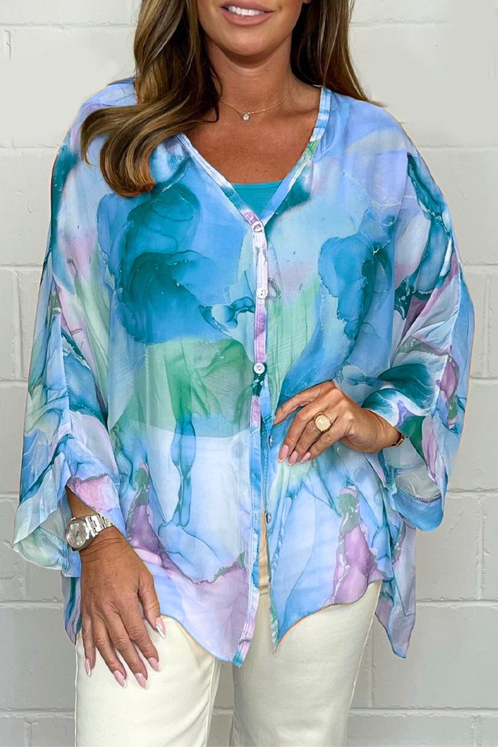 Fashionable women's printed top, long sleeve & elegant design. Perfect comfortable shirt for spring & summer style.