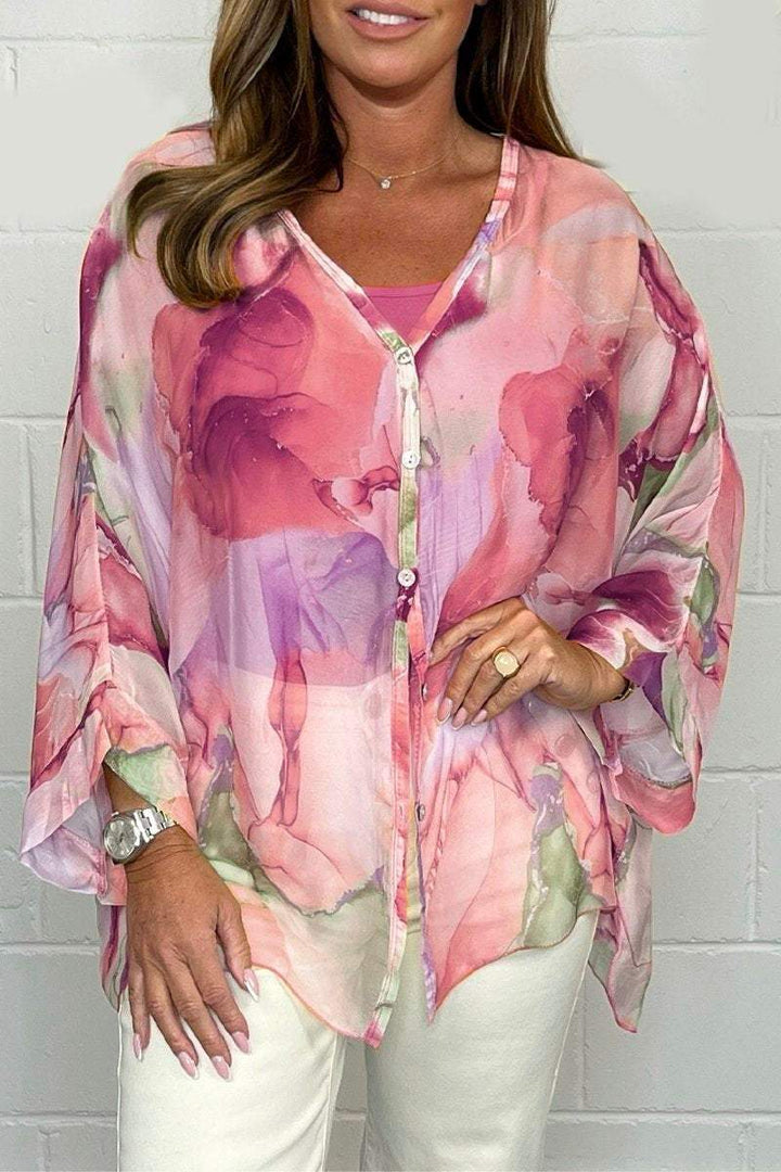 Effortlessly chic women's long sleeve printed blouse, comfortable and stylish for spring/summer fashion.