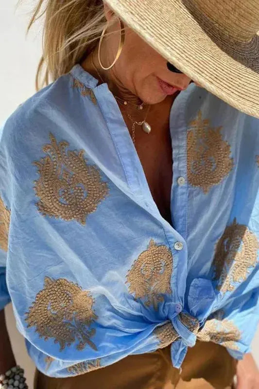 Stylish women's printed top, a comfortable long sleeve blouse for office attire or casual ladies fashion.