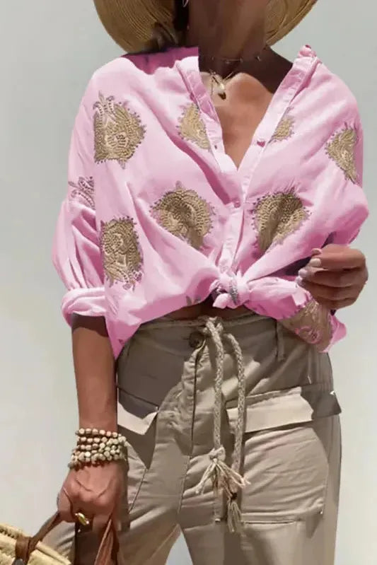 Chic women's printed blouse, an elegant long sleeve design for versatile work wear and everyday style.