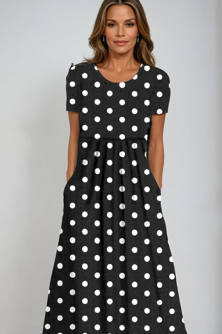 Elegant women's printed maxi dress. Flattering full-length design, perfect for formal parties & evening occasions.