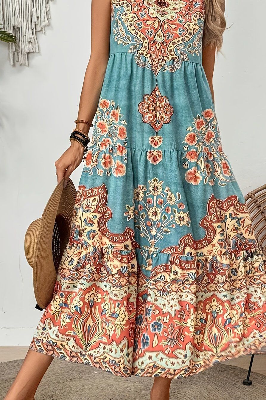 Full-length view of an elegant women's printed maxi dress, showcasing its flattering fit and long, flowy design.